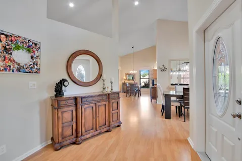 a view of a living room and dining room