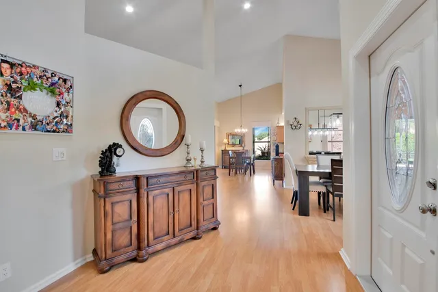 a view of a living room and dining room