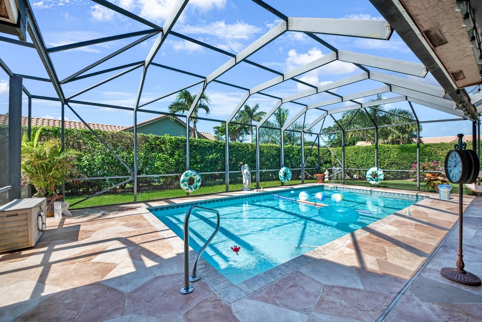 19261 Cherry Hills Terrace Boca Raton, FL 33498 - Photo 33 of 53 a view of a swimming pool with a patio