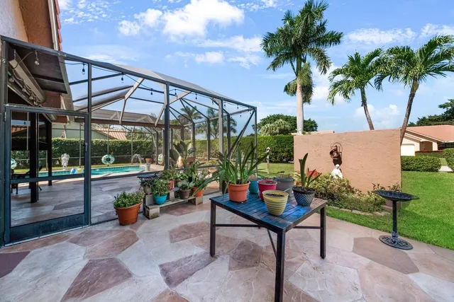 a outdoor space with lots of potted plants