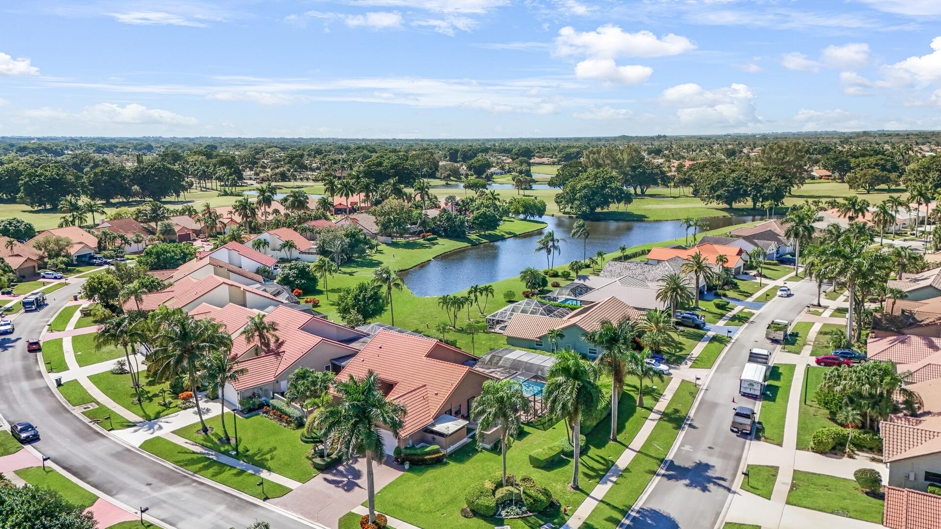 19261 Cherry Hills Terrace Boca Raton, FL 33498 - Photo 42 of 53 a view of a lake with a city