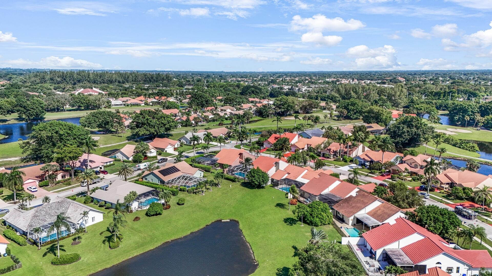 19261 Cherry Hills Terrace Boca Raton, FL 33498 - Photo 44 of 53 an aerial view of residential houses with outdoor space