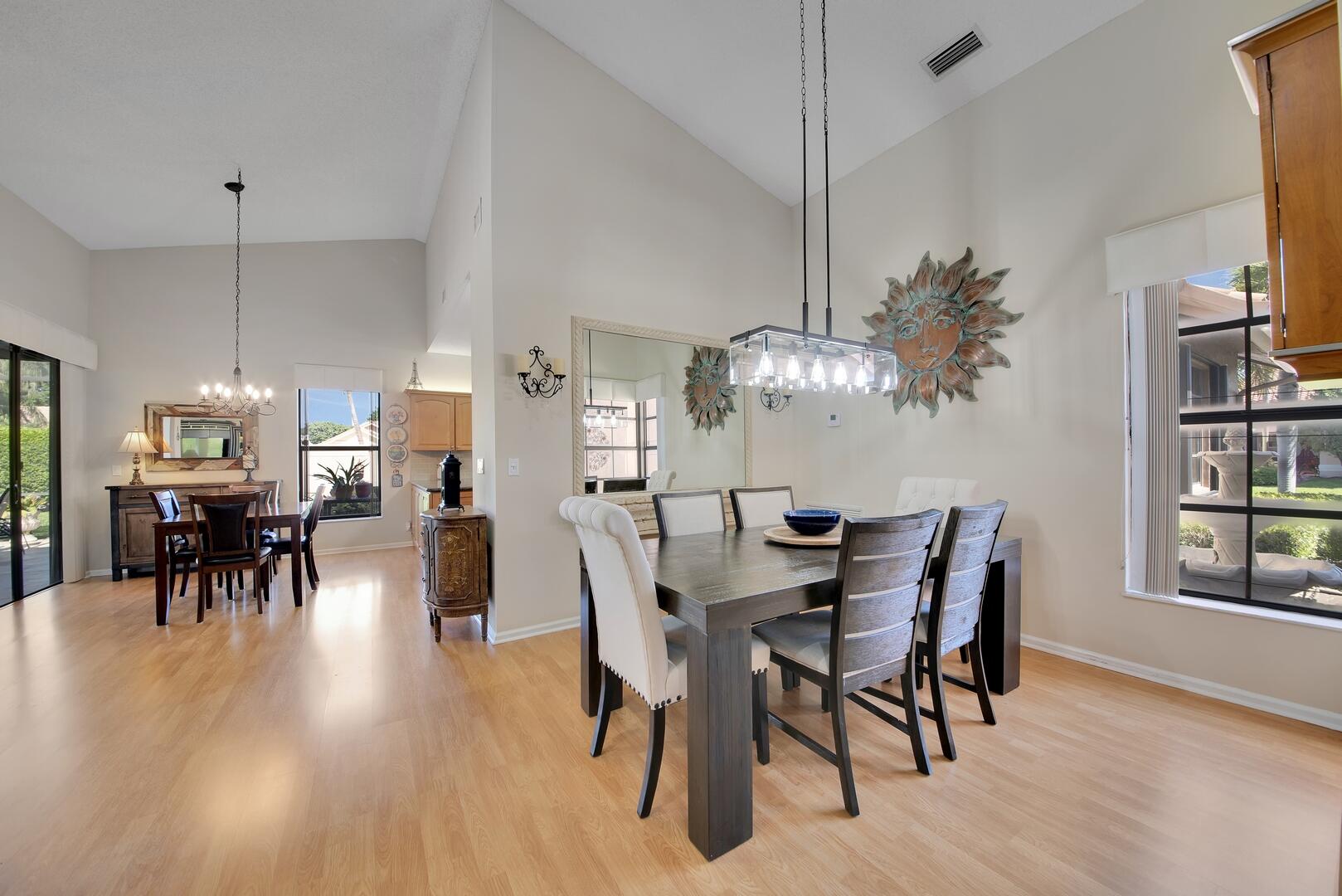 19261 Cherry Hills Terrace Boca Raton, FL 33498 - Photo 5 of 53 a view of a dining room with furniture and chandelier