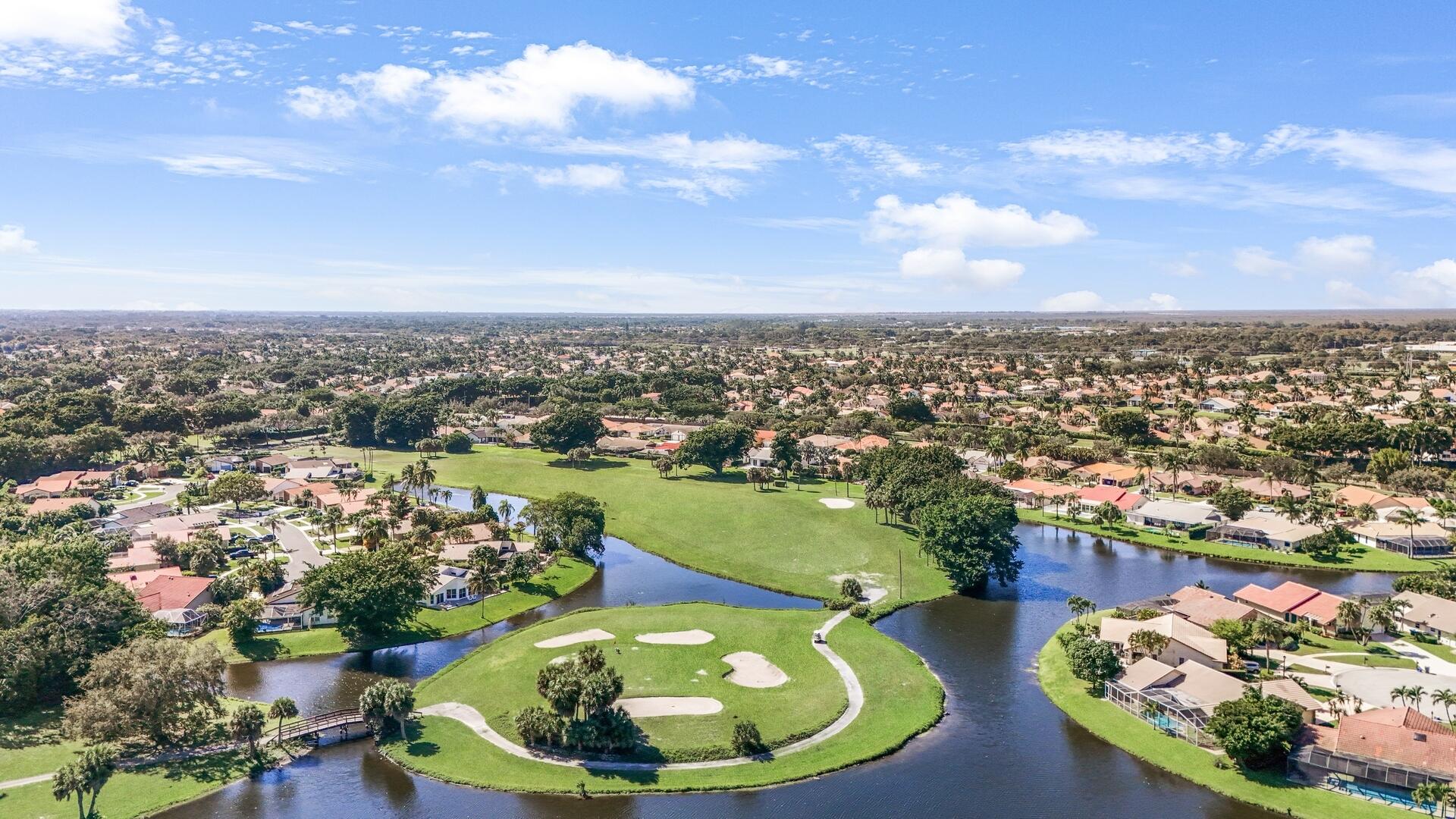 19261 Cherry Hills Terrace Boca Raton, FL 33498 - Photo 50 of 53 an aerial view of a house with yard swimming pool and outdoor seating