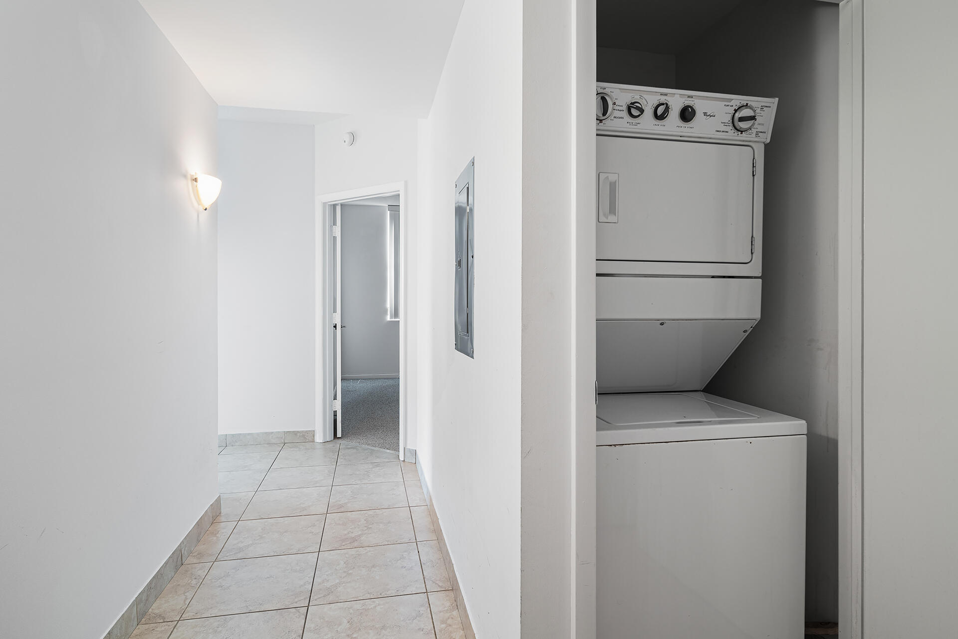 550 Okeechobee Boulevard, Unit 428 West Palm Beach, FL 33401 - Photo 21 of 29 a utility room with dryer and washer