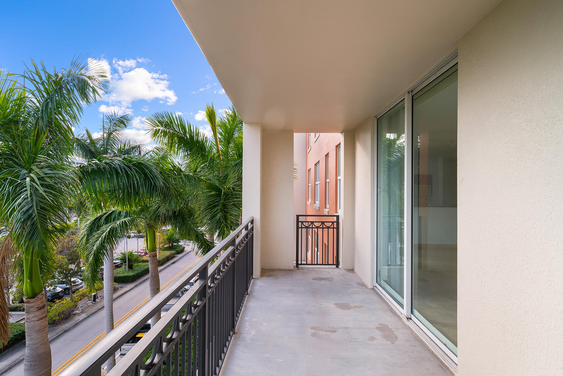 550 Okeechobee Boulevard, Unit 428 West Palm Beach, FL 33401 - Photo 27 of 29 a view of balcony and wooden floor