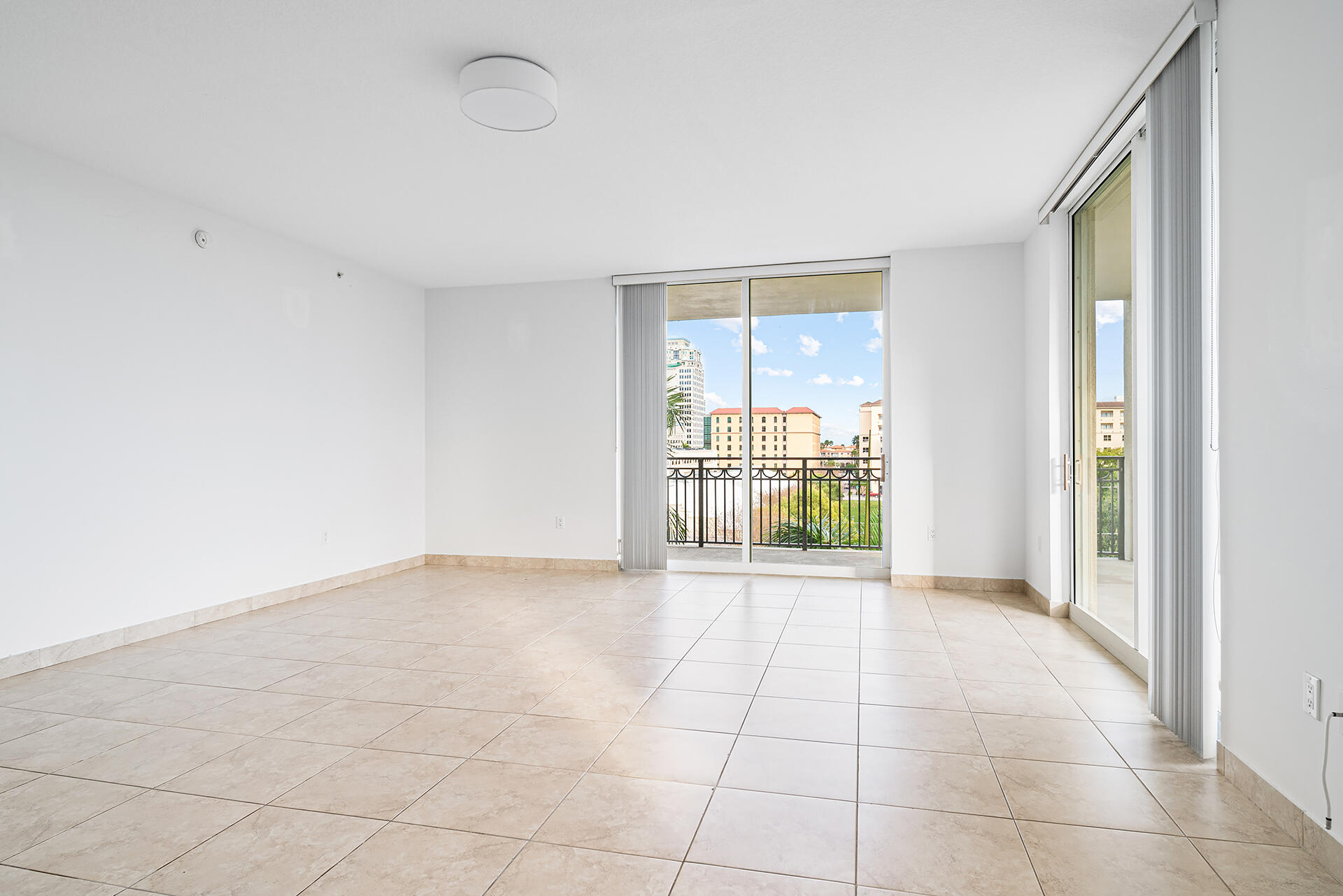 550 Okeechobee Boulevard, Unit 428 West Palm Beach, FL 33401 - Photo 3 of 29 a view of an empty room with a window