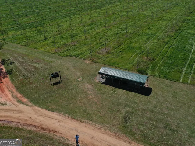 a view of a lake with a yard