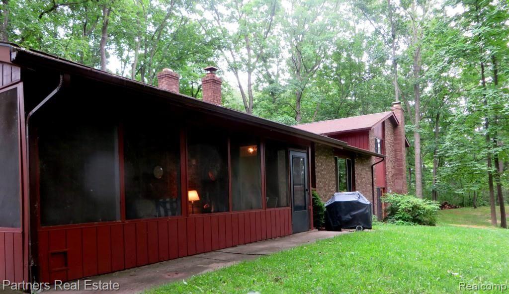 530 Timber Ridge Trail Howell, MI 48843 - Photo 13 of 60 Private cozy screened in porch for your morning coffee