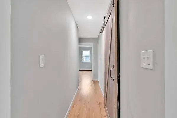 a view of hallway with stairs