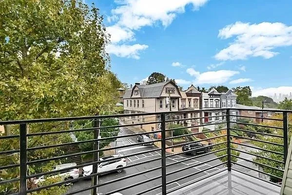 a view of a city from a balcony