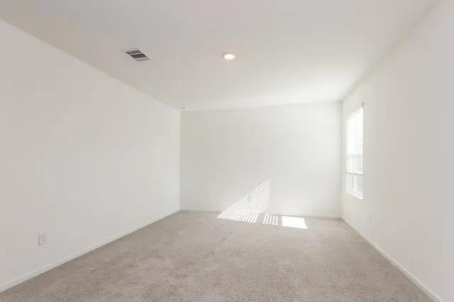 a bathroom with a double vanity sink and mirror