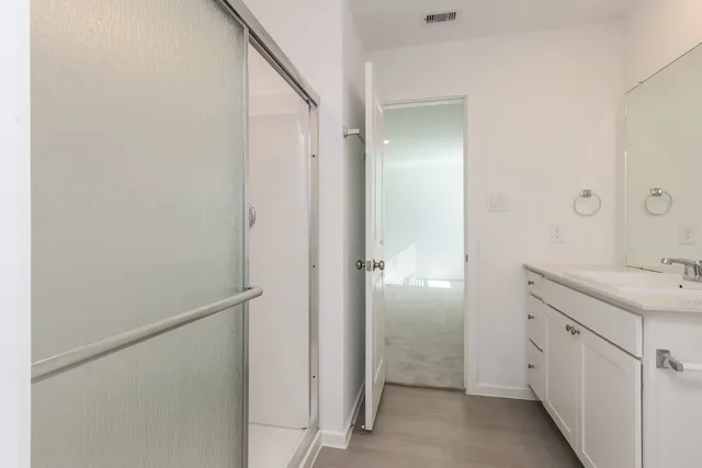 a bathroom with a sink a toilet and a bathtub