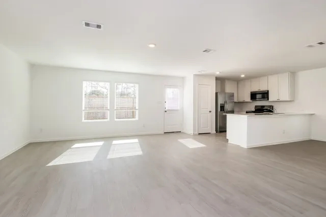 a view of a kitchen with a sink