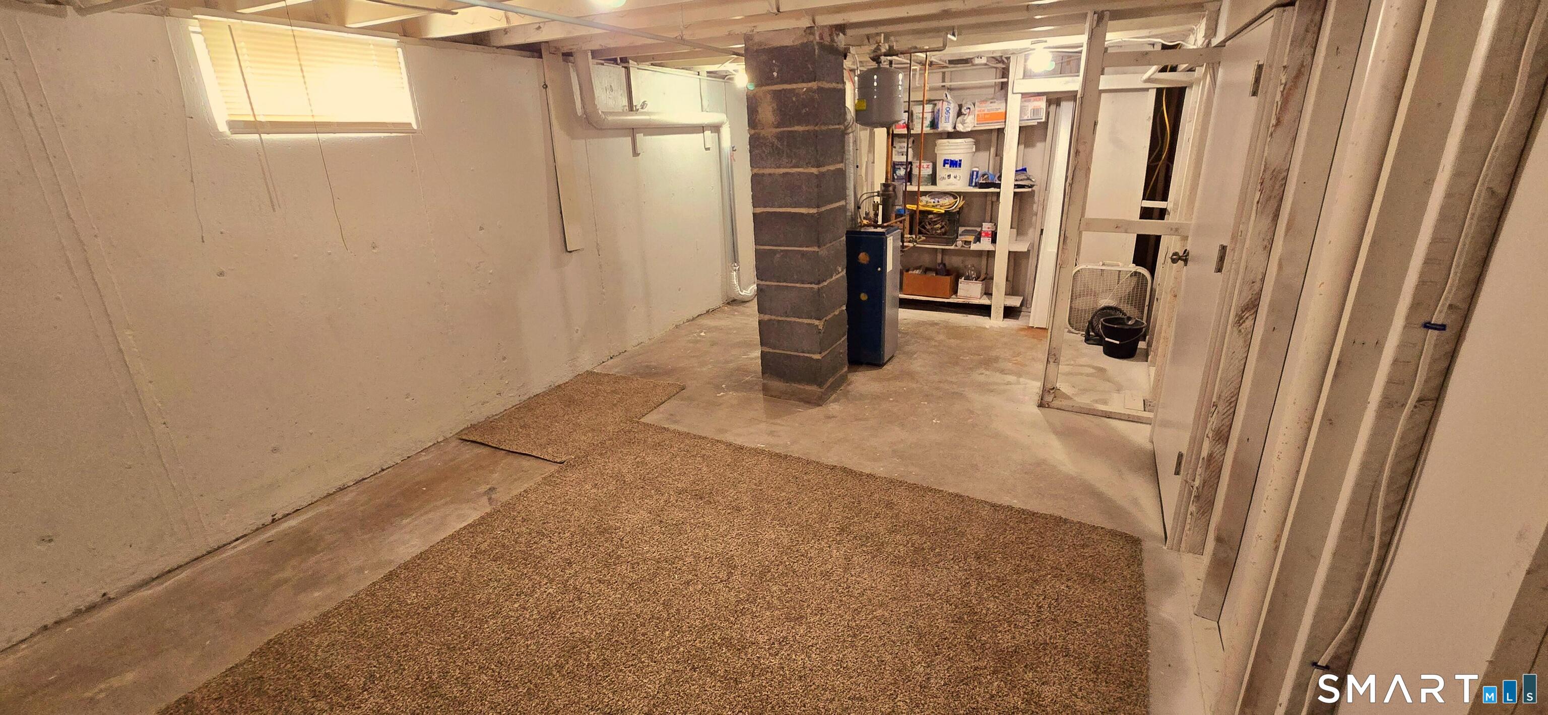 64 4th Street Bristol, CT 06010 - Photo 28 of 44 a view of a livingroom with a furniture