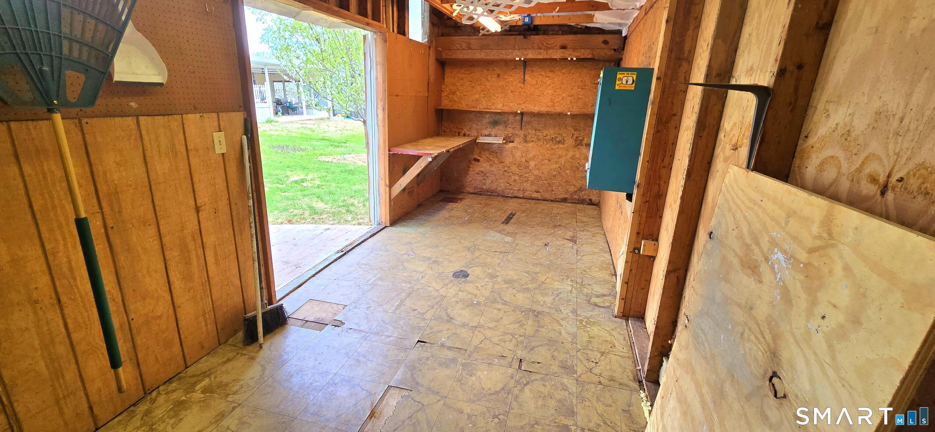 64 4th Street Bristol, CT 06010 - Photo 35 of 44 a view of a bathroom with shower and wooden floor