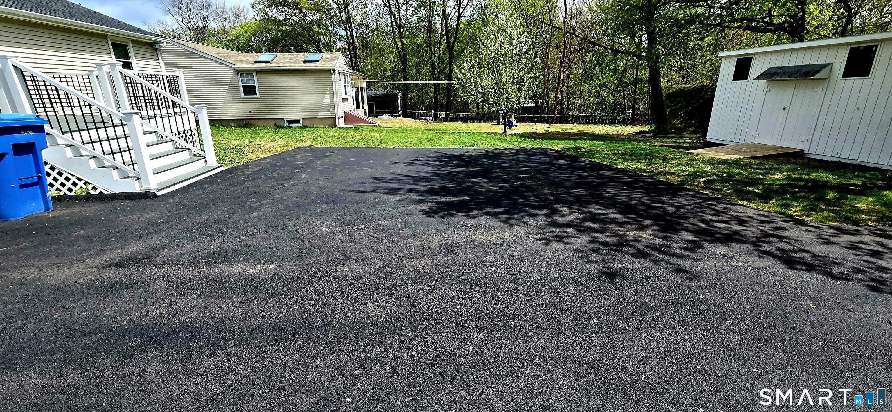 64 4th Street Bristol, CT 06010 - Photo 38 of 44 a view of a house with a yard