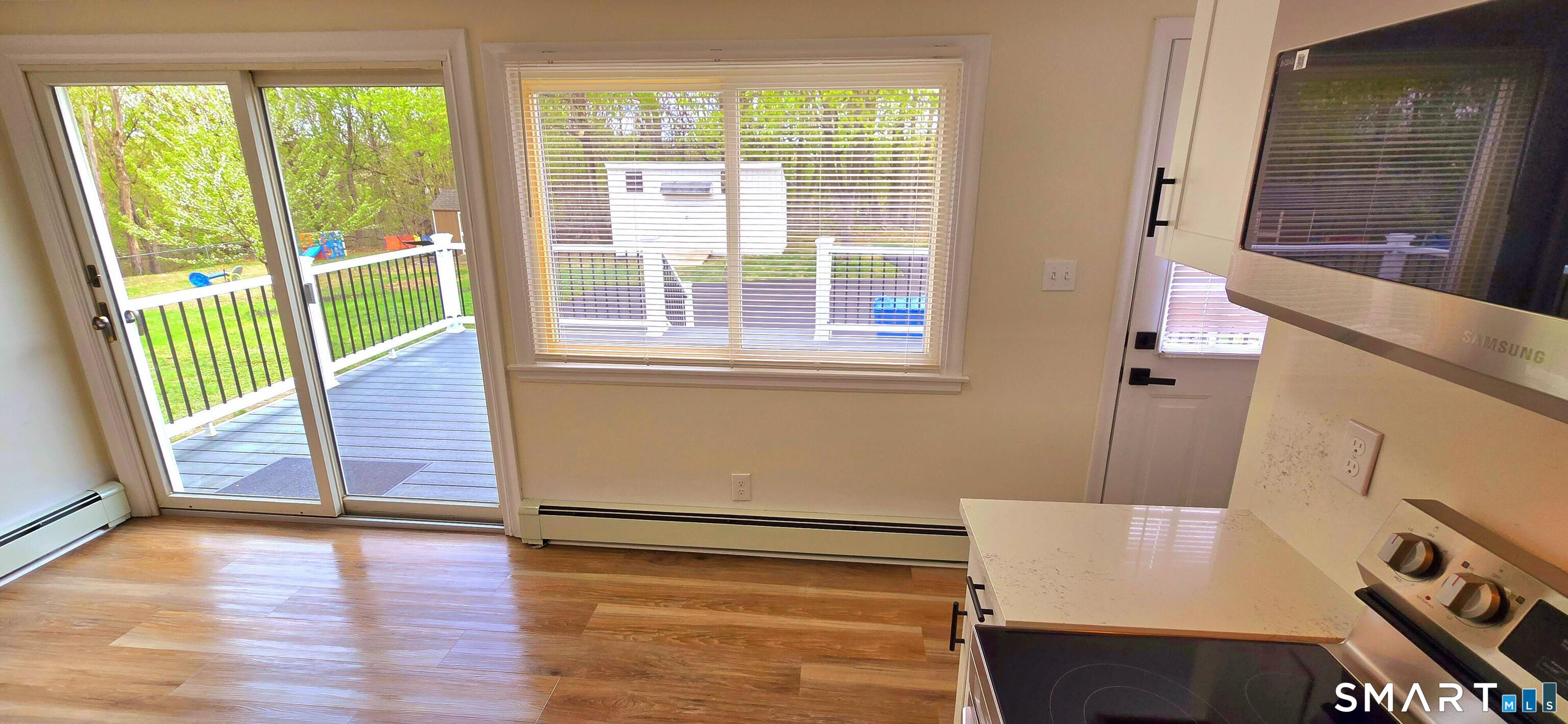 64 4th Street Bristol, CT 06010 - Photo 6 of 44 a view of an empty room with a window