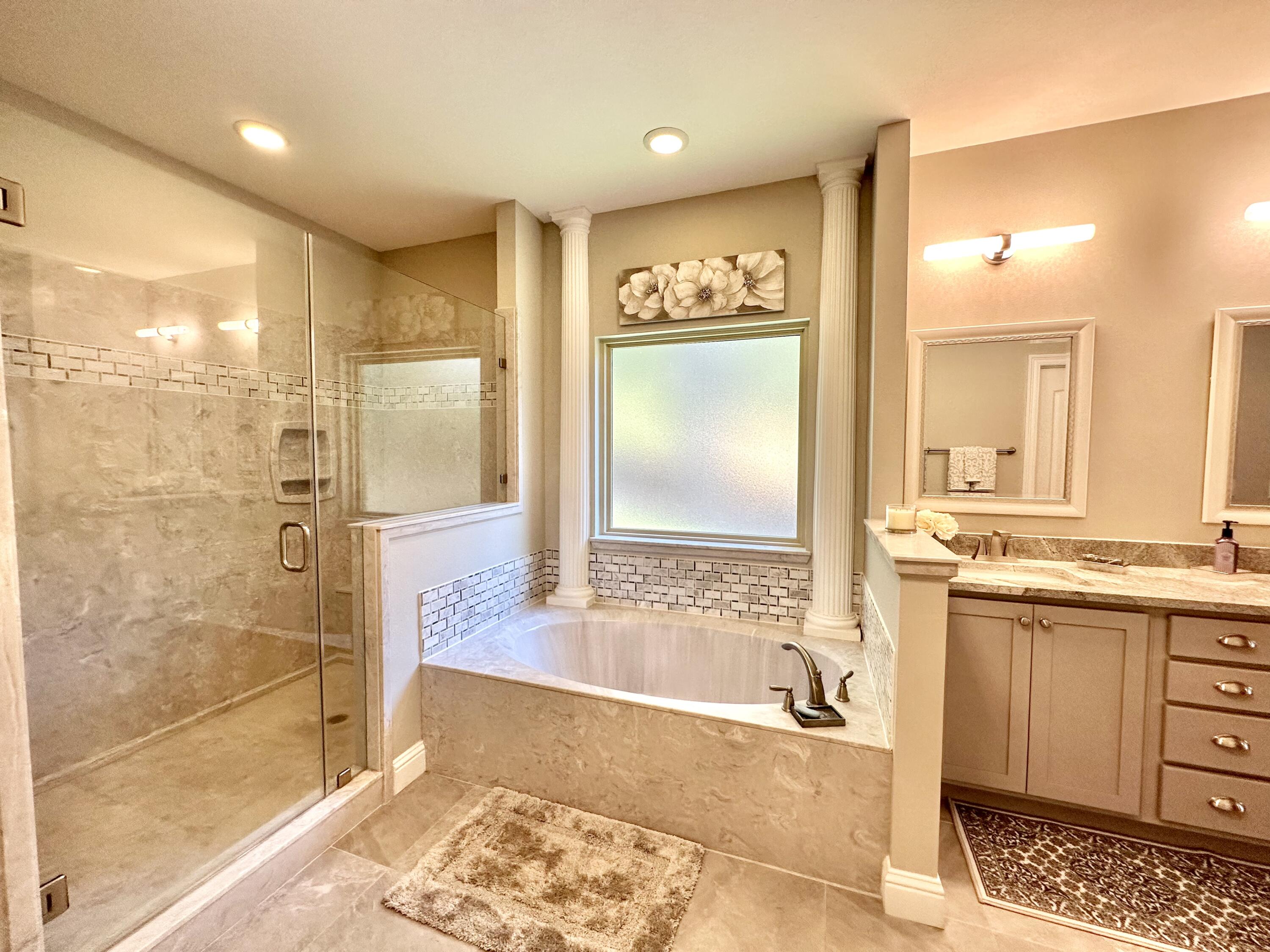 1207 Tallokas Road Crestview, FL 32536 - Photo 34 of 58 a bathroom with a bathtub and a shower