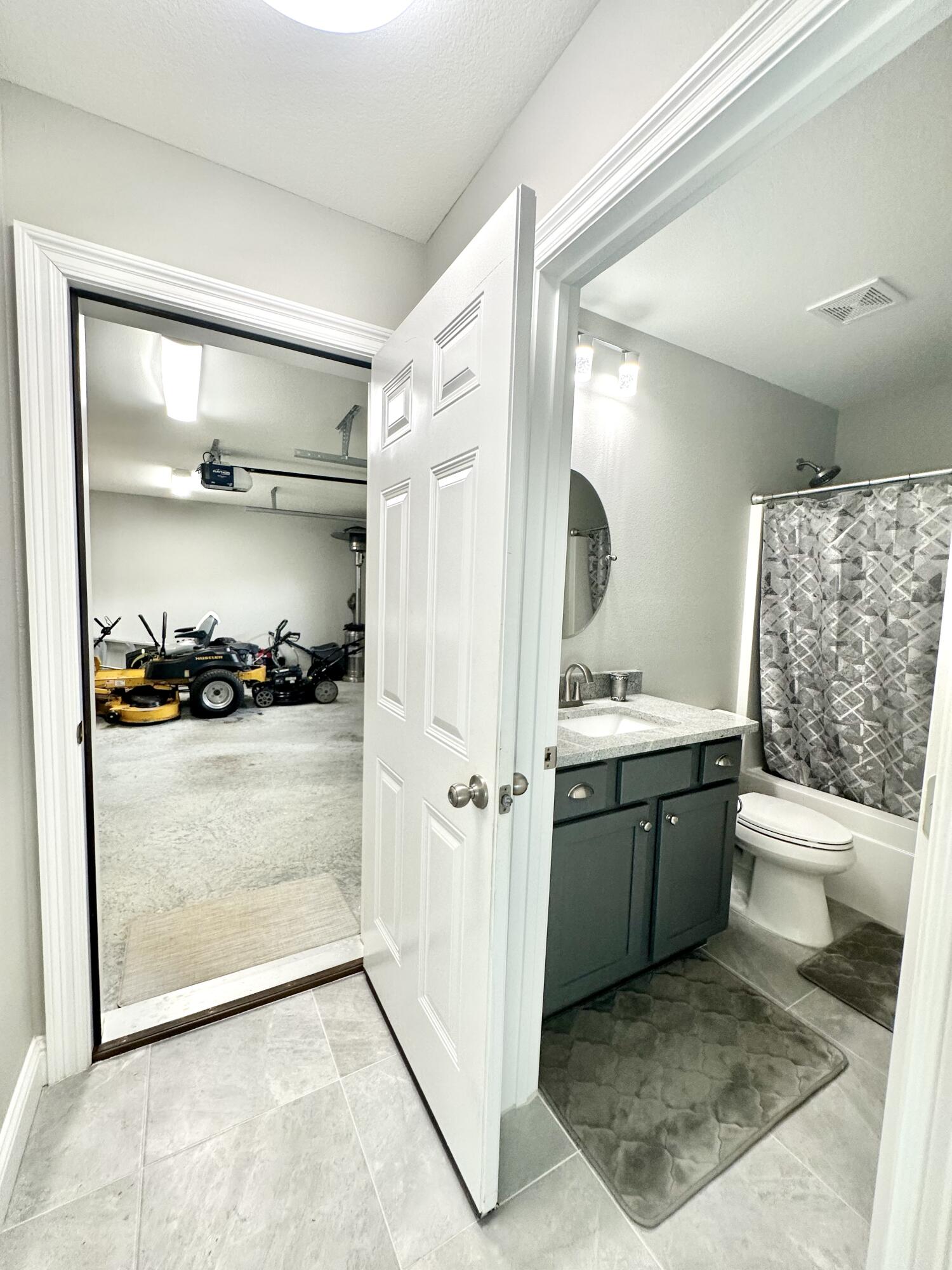 1207 Tallokas Road Crestview, FL 32536 - Photo 52 of 58 a bathroom with a sink a toilet and shower