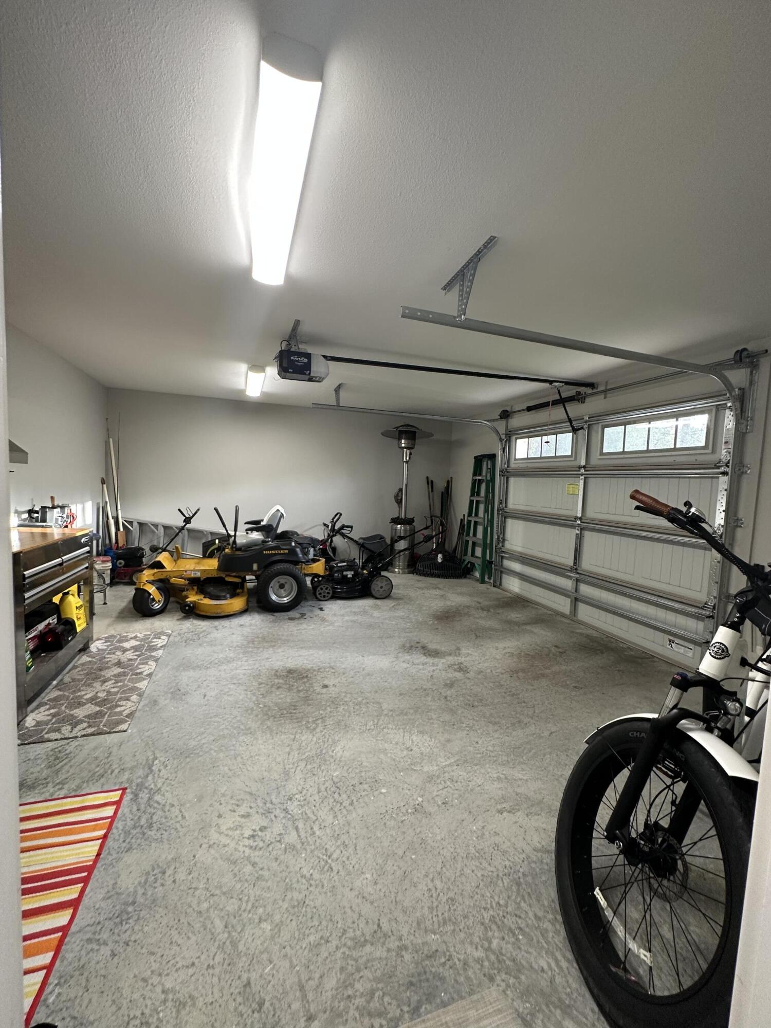 1207 Tallokas Road Crestview, FL 32536 - Photo 54 of 58 a view of a garage with cars