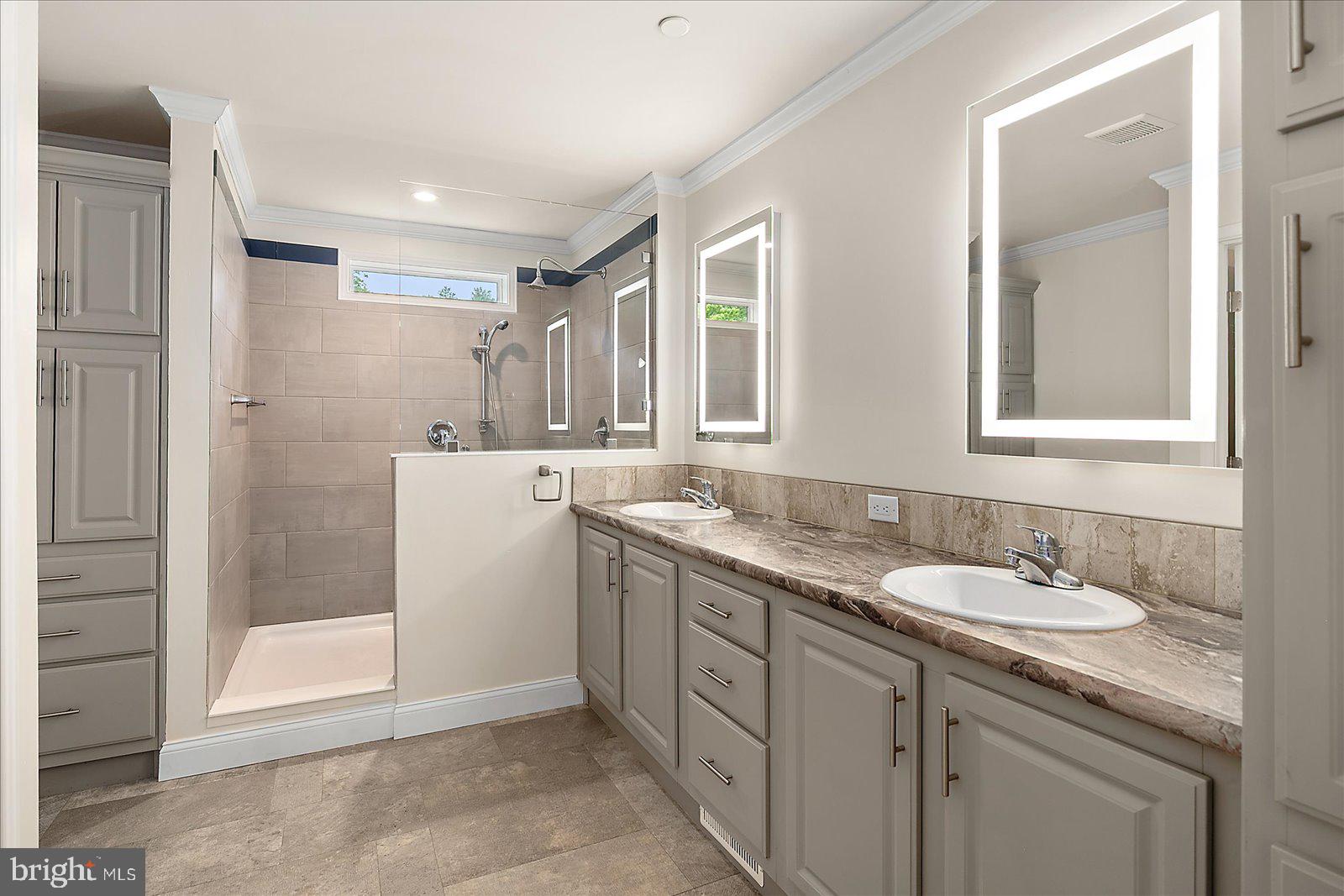 8225 Whitesville Road Pittsville, MD 21850 - Photo 9 of 45 a bathroom with a granite countertop sink mirror and double