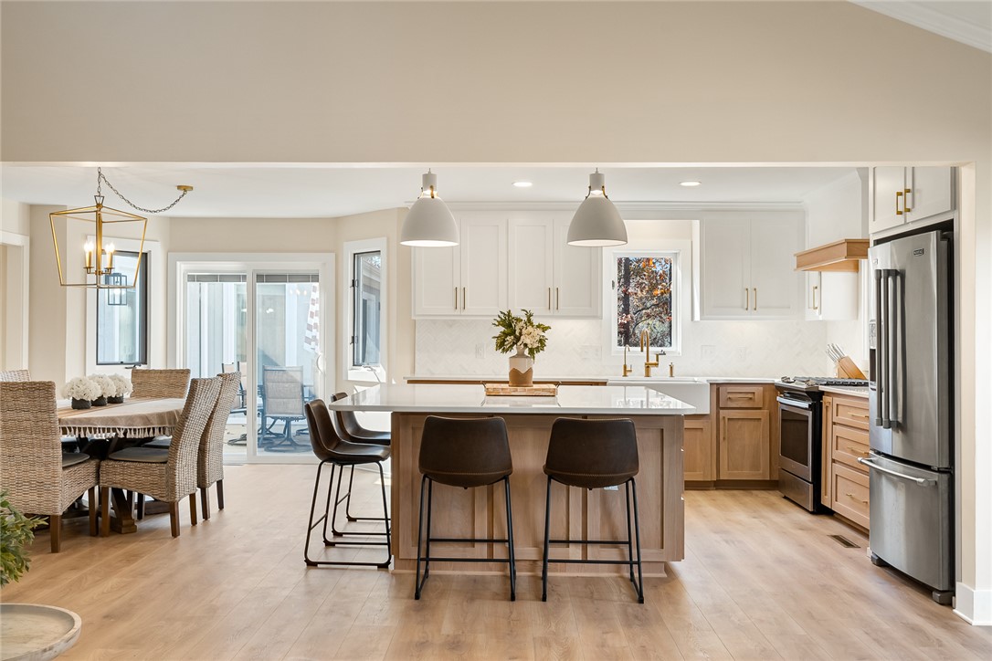 425 Graham Road Anderson, SC 29625 - Photo 10 of 49 Kitchen/dining room space with sliding doors to one of the decks.