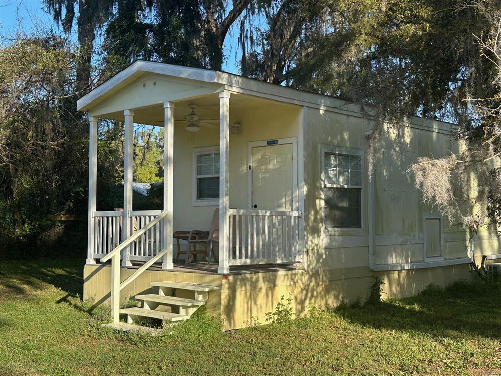 2750 Northwest 137th Place Reddick, FL 32686 - Photo 1 of 1 a view of a house with backyard