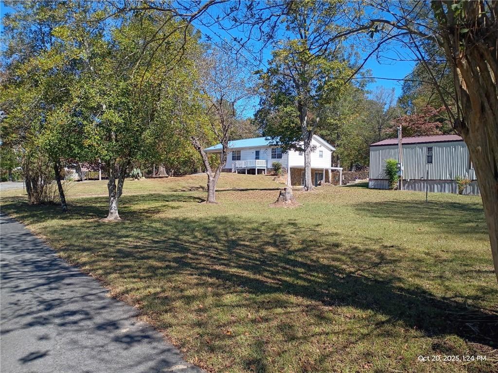 a house view with a garden space