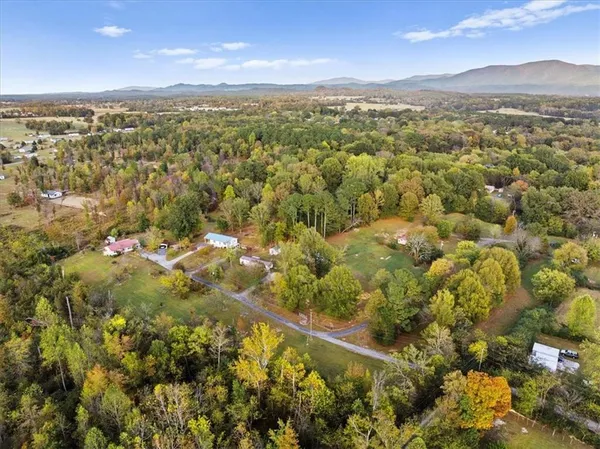a view of a city with mountains in the background