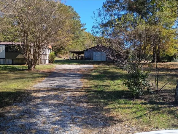 a house with trees in the background
