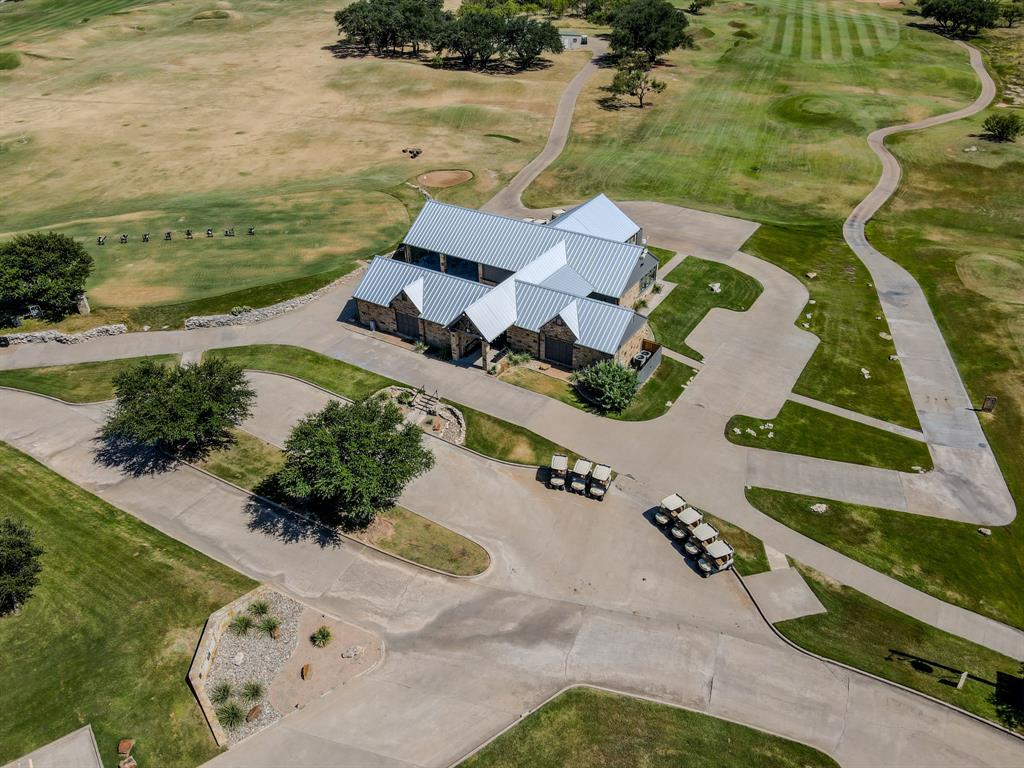 1204 Eagle Point Road Graford, TX 76449 - Photo 24 of 30 an aerial view of a house with a yard