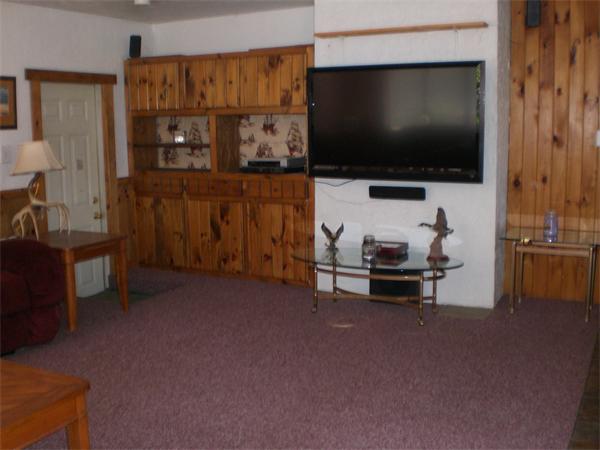 698 Town Farm Road Warren, MA 01083 - Photo 17 of 19 a living room with furniture and a flat screen tv