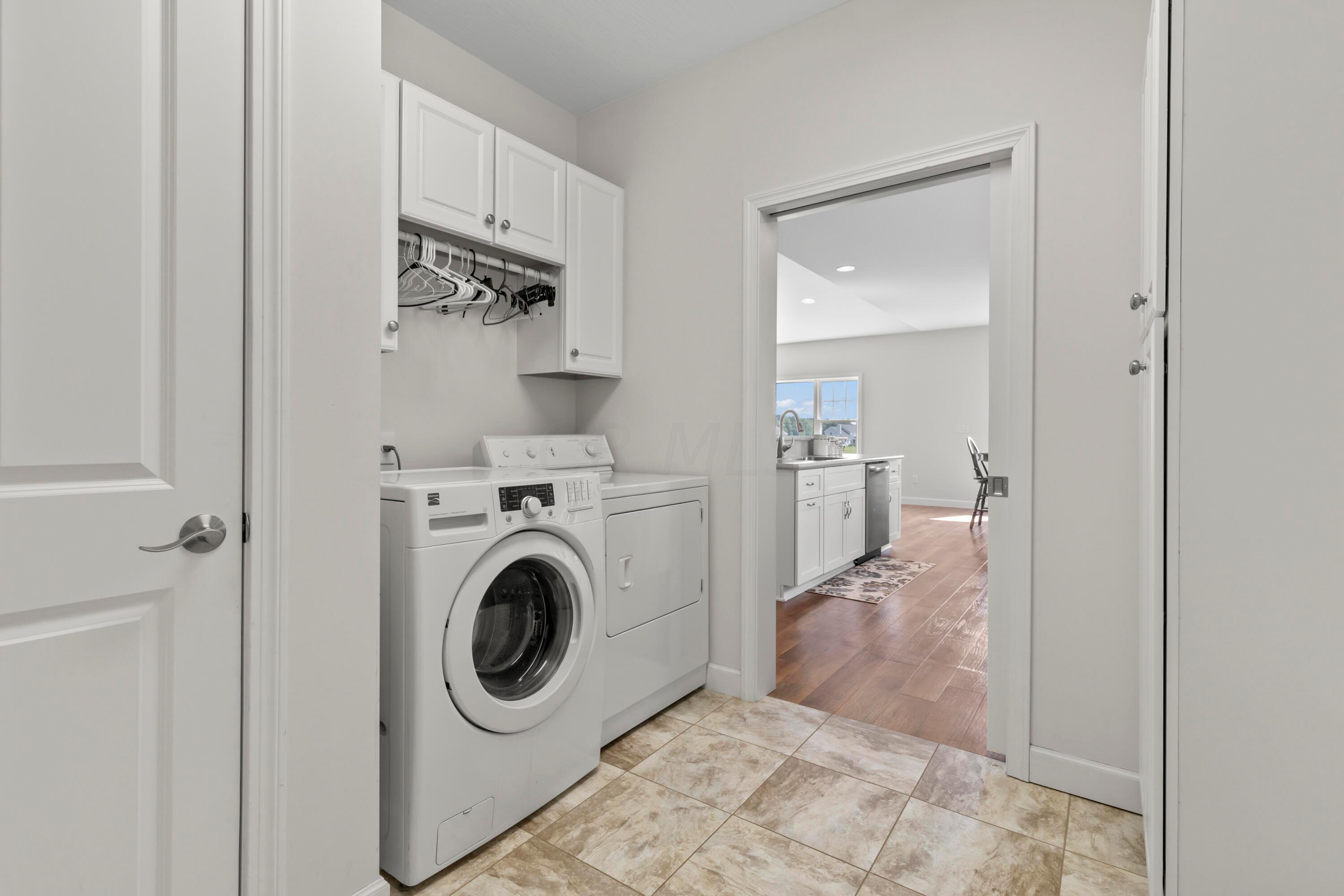 3644 Panhandle Road Delaware, OH 43015 - Photo 33 of 46 • “Ceramic look” vinyl flooring
• Ivory painted walls
• Ceiling light
• Electric dryer hookup
• Wall cabinets
• Washer and dryer remain
• Bench seat