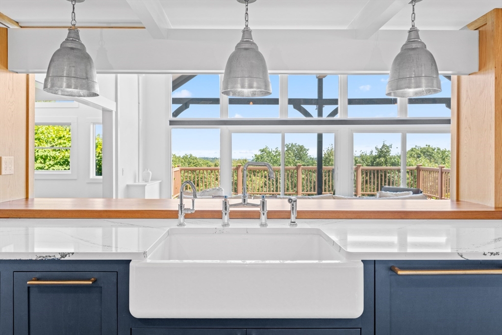 56 Hill Top Road Gloucester, MA 01930 - Photo 14 of 35 a kitchen with a sink and a large window