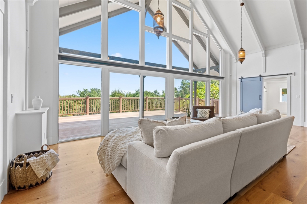 56 Hill Top Road Gloucester, MA 01930 - Photo 20 of 35 a living room with furniture and a large window