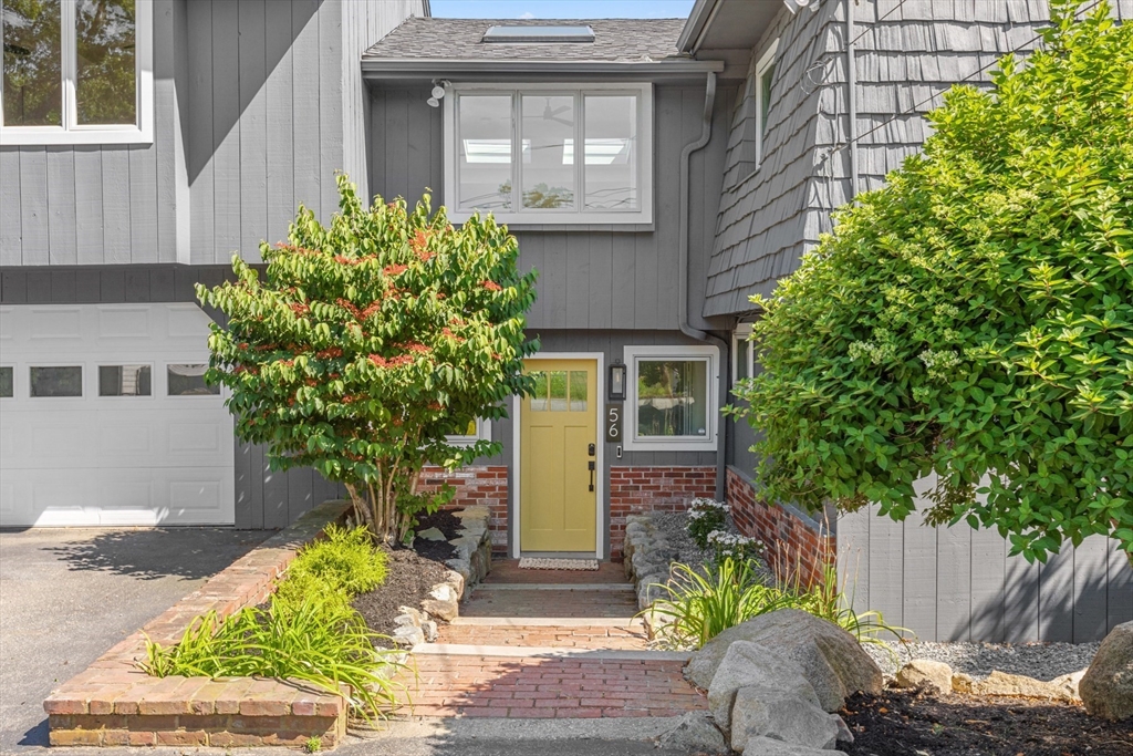 56 Hill Top Road Gloucester, MA 01930 - Photo 2 of 35 a front view of a house with garden