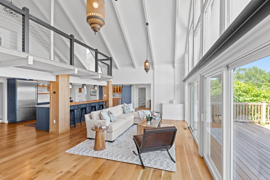 56 Hill Top Road Gloucester, MA 01930 - Photo 22 of 35 a living room with furniture and a fireplace