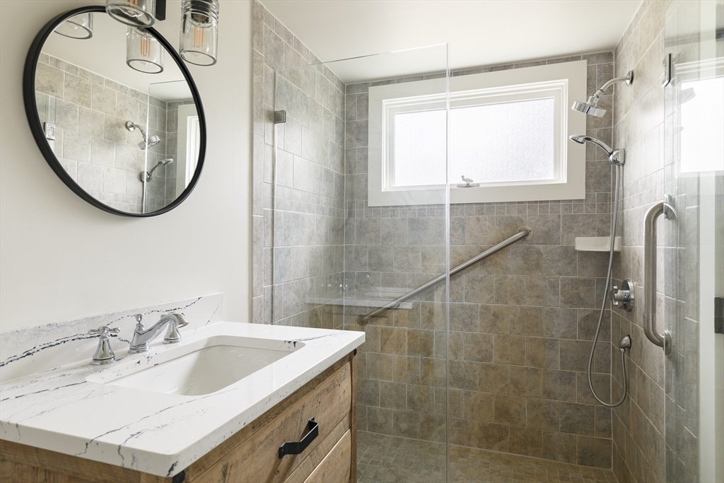 56 Hill Top Road Gloucester, MA 01930 - Photo 25 of 35 a bathroom with a sink and a mirror