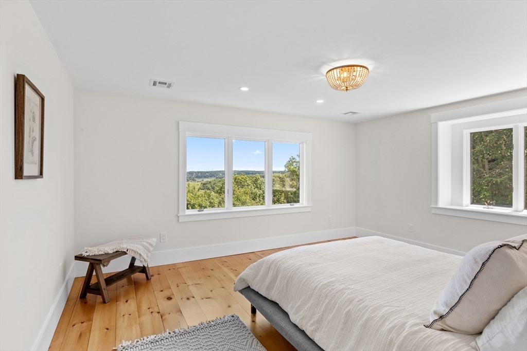 56 Hill Top Road Gloucester, MA 01930 - Photo 34 of 35 a bedroom with a bed and a window