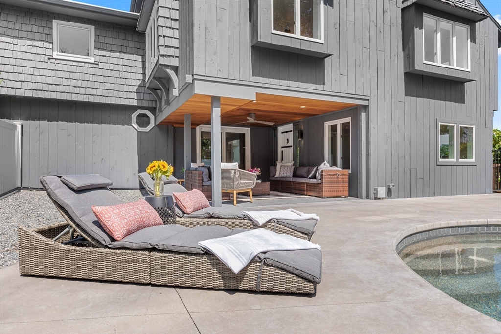 56 Hill Top Road Gloucester, MA 01930 - Photo 6 of 35 a outdoor space with a couch and chairs