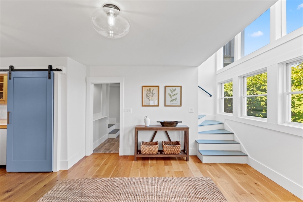 56 Hill Top Road Gloucester, MA 01930 - Photo 10 of 35 a living room with furniture and a rug