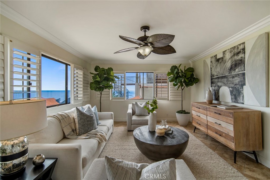 32041 Point Place Laguna Beach, CA 92651 - Photo 11 of 59 a living room with furniture potted plant and a window