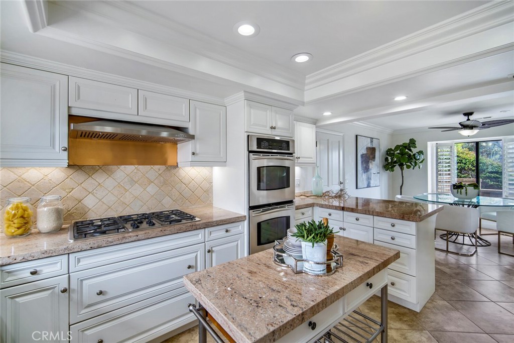 32041 Point Place Laguna Beach, CA 92651 - Photo 15 of 59 a kitchen with sink stove and refrigerator
