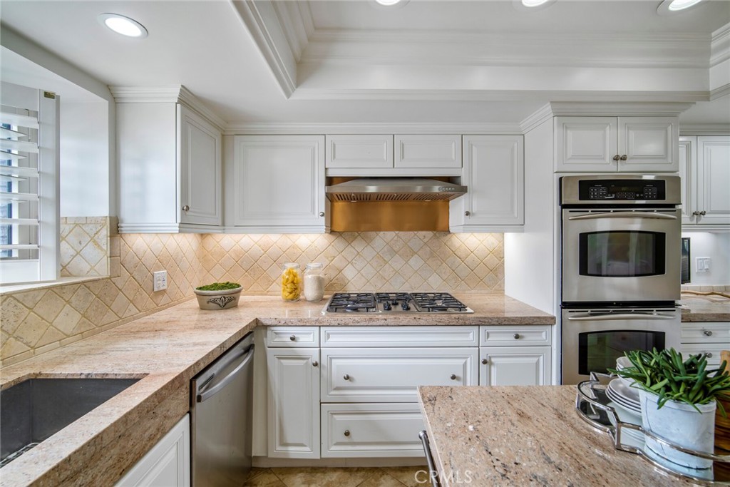 32041 Point Place Laguna Beach, CA 92651 - Photo 16 of 59 a kitchen with a stove and a sink