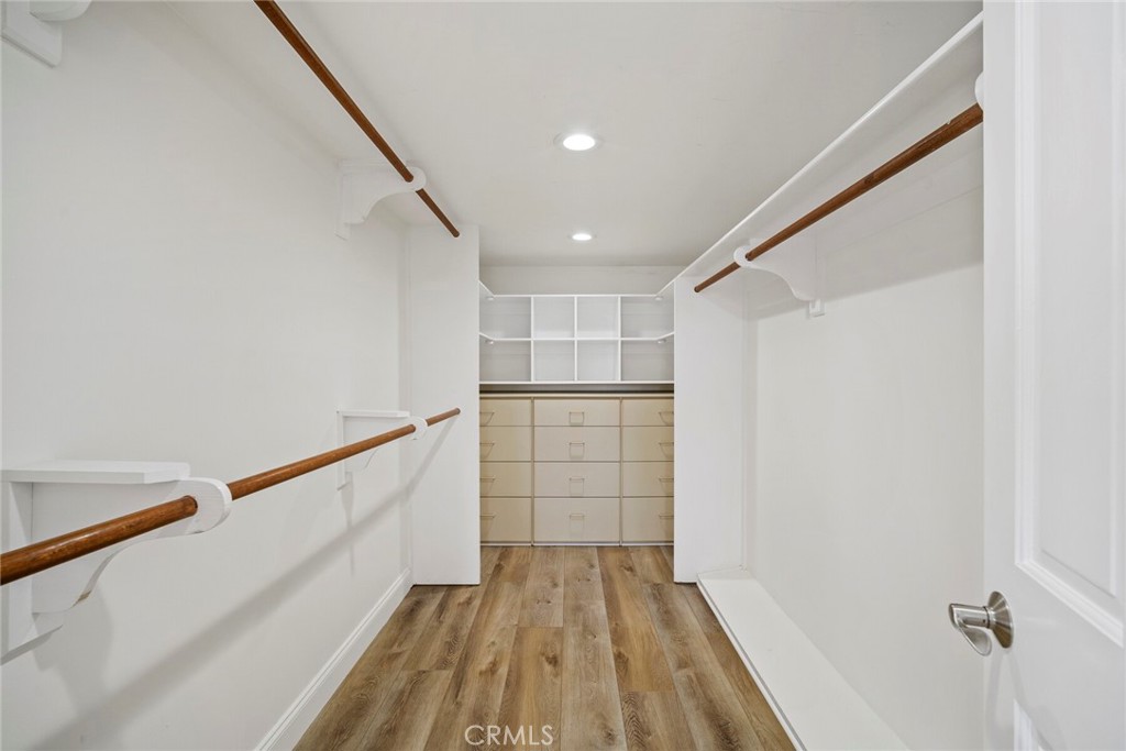 32041 Point Place Laguna Beach, CA 92651 - Photo 30 of 59 a view of walk in closet with wooden floor