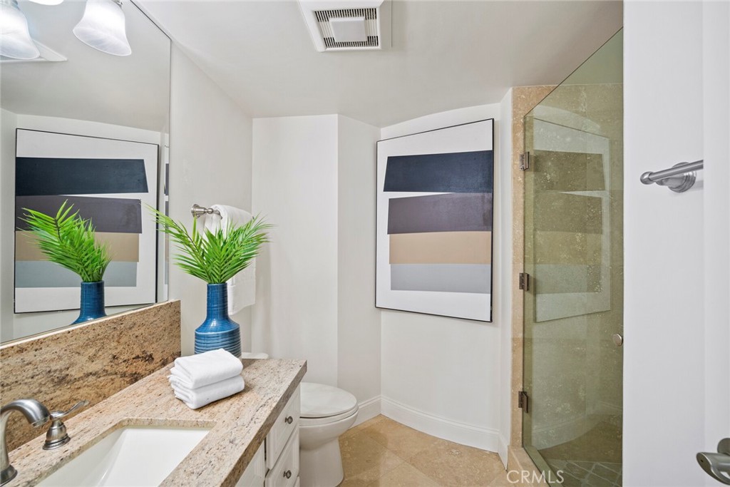 32041 Point Place Laguna Beach, CA 92651 - Photo 33 of 59 a living room with furniture and a potted plant