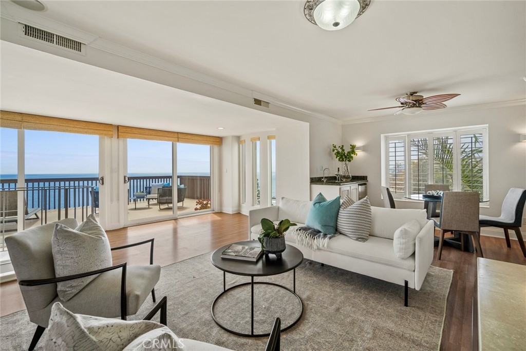32041 Point Place Laguna Beach, CA 92651 - Photo 38 of 59 a living room with furniture potted plant and a large window