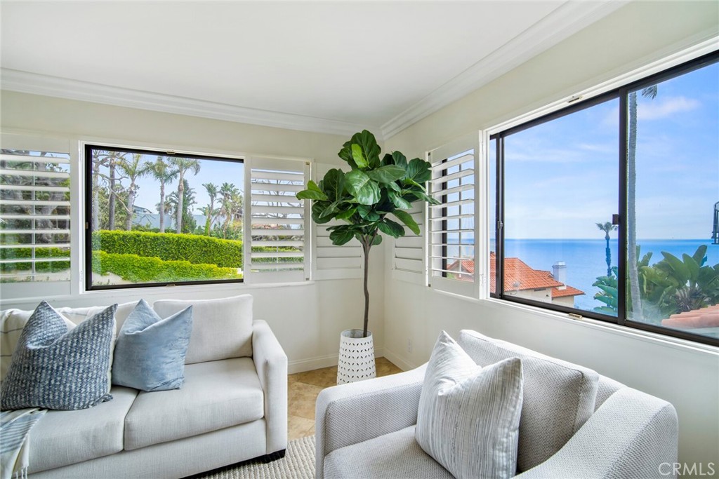 32041 Point Place Laguna Beach, CA 92651 - Photo 10 of 59 a living room with furniture and a large window