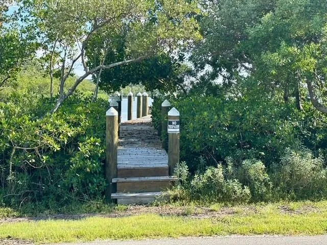 a view of a chairs and table on the terrace
